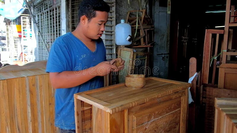 The young carpenter at work, Yangon, Myanmar