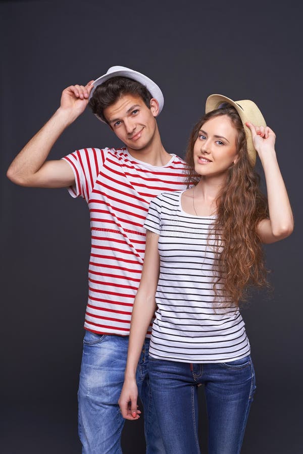 Young casual couple greeting