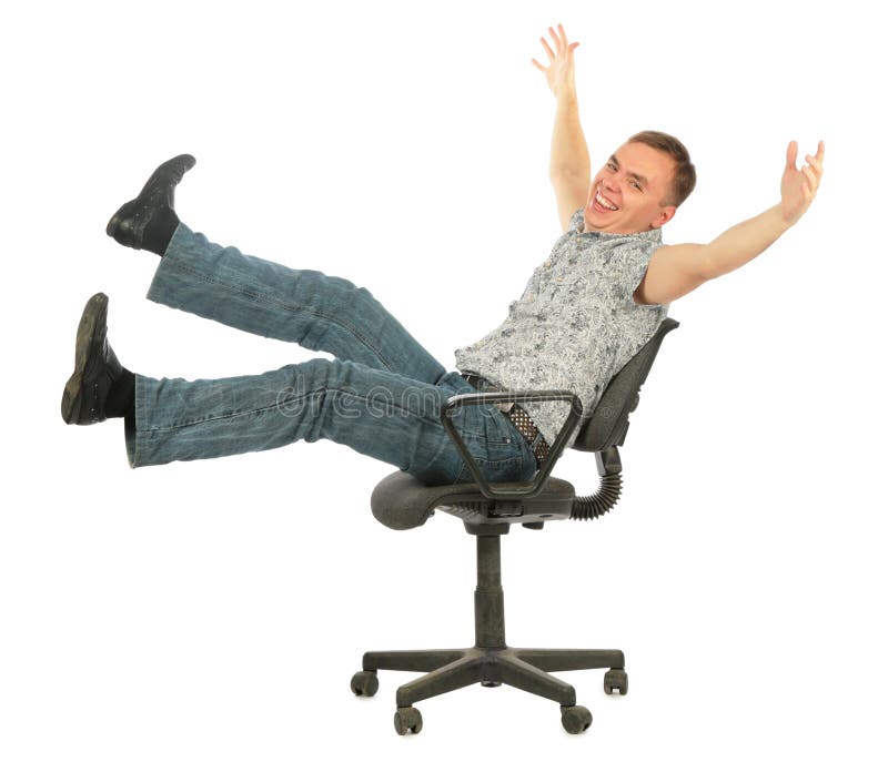 Young casual man laugh sits on chair