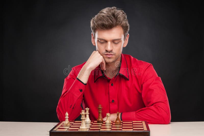 Man playing chess against computer Stock Photo by ©STYLEPICS 11294363