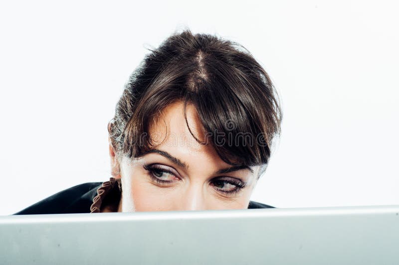Young brunette working with her laptop