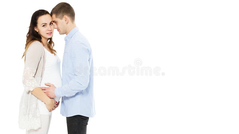 Young caucasian couple: pregnant mother and happy father on white background, baby born stock image Young caucasian couple: pregnant mother and happy father on white background, baby born stock image