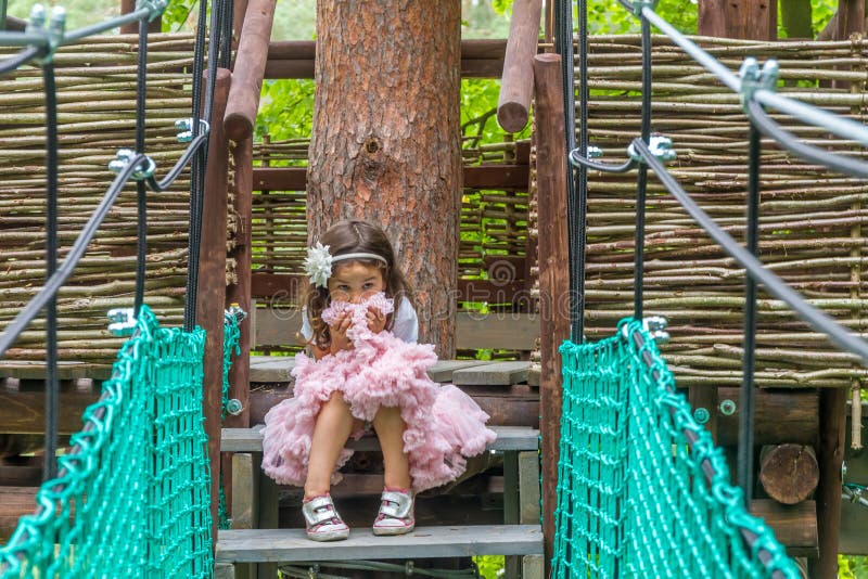 Young caucasian girl in adventure park stock images Young caucasian girl in adventure park stock images