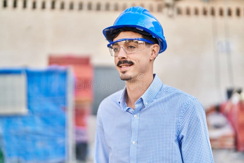 Young caucasian man architect smiling confident standing at street royalty free stock photography