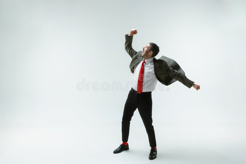 Young Caucasian Man Moving Flexible on White Studio Background Stock ...