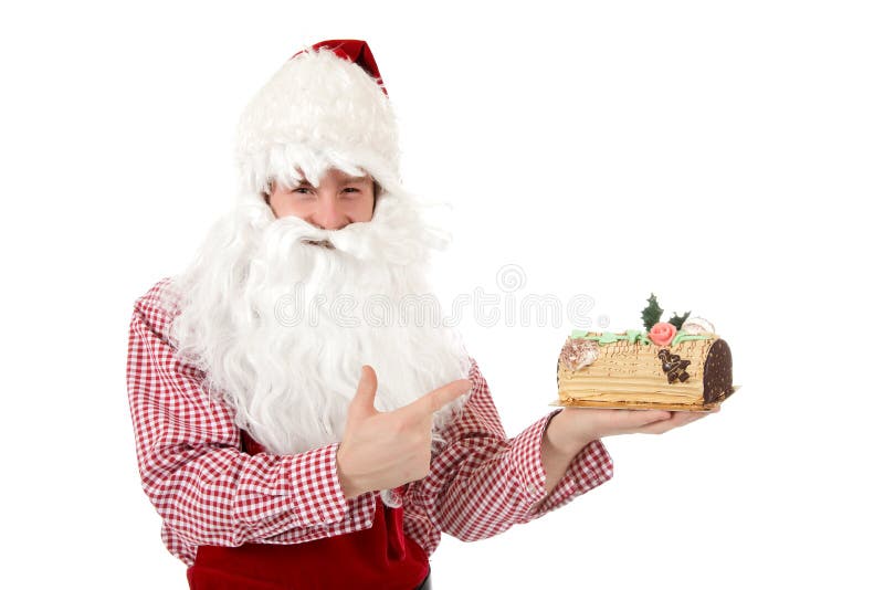 Young caucasian man Santa Claus, cake