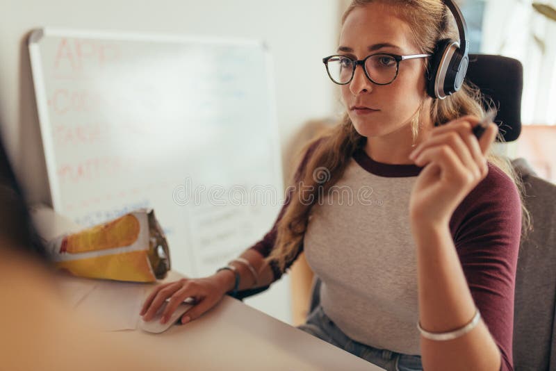 Female programmer working on new software development royalty free stock photography