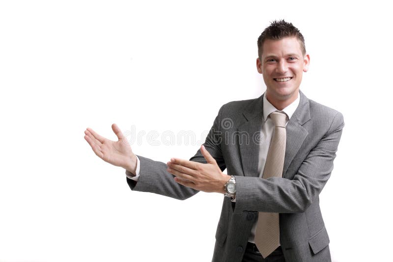 Young cheerful business man giving a presentation stock photo