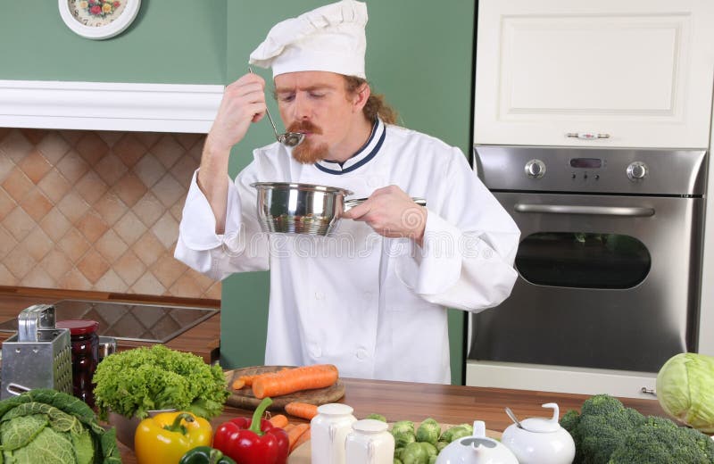 Funny Cooking. Attractive Caucasian Man In The Kitchen Stock Photo, Picture  and Royalty Free Image. Image 65857067.