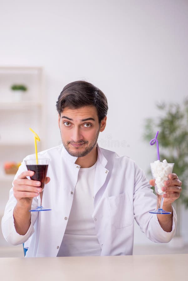 Young Male Chemist Examining Soft Drink at the Lab Stock Image Image