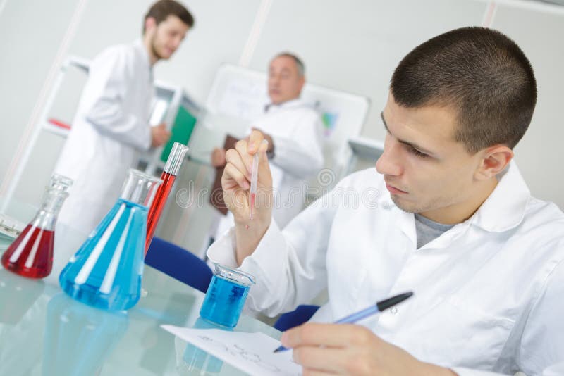 Young Chemist Makes Chemical Test in Laboratory Stock Image Image of