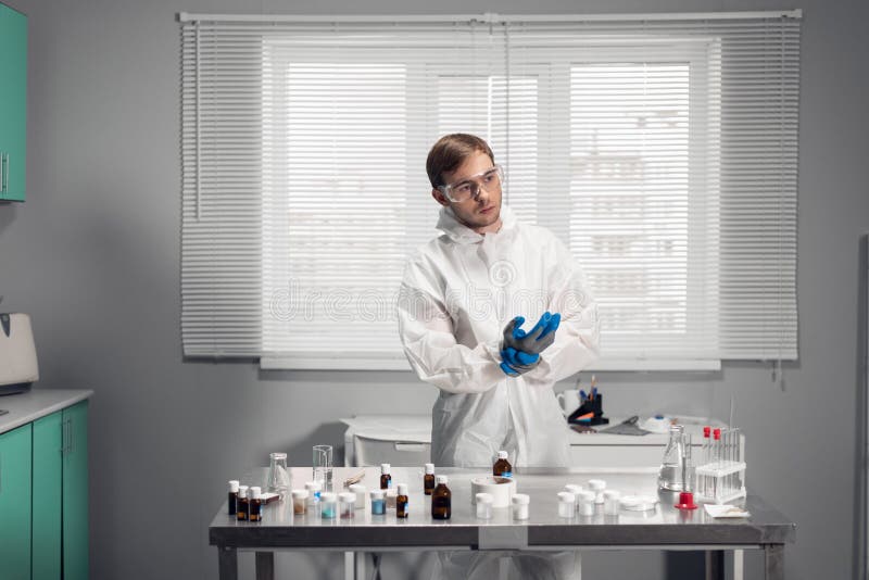 Young chemist, student working in a lab, doing some testing stock photos