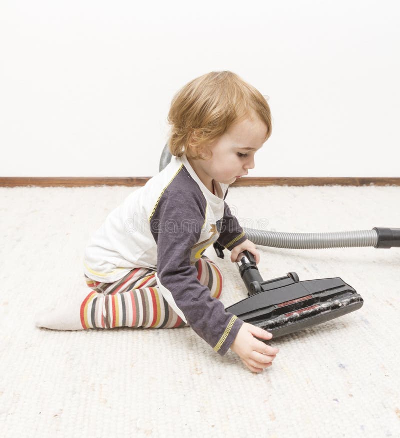 Young Child Cleaning Vacuum Cleaner Stock Photo Image of carpeted, preschooler 35337558