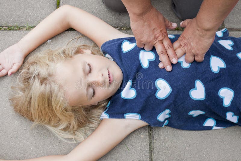 Young child receiving first aid
