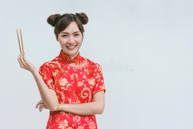 Young Chinese Woman Holding Chopsticks. Stock Image Image of food