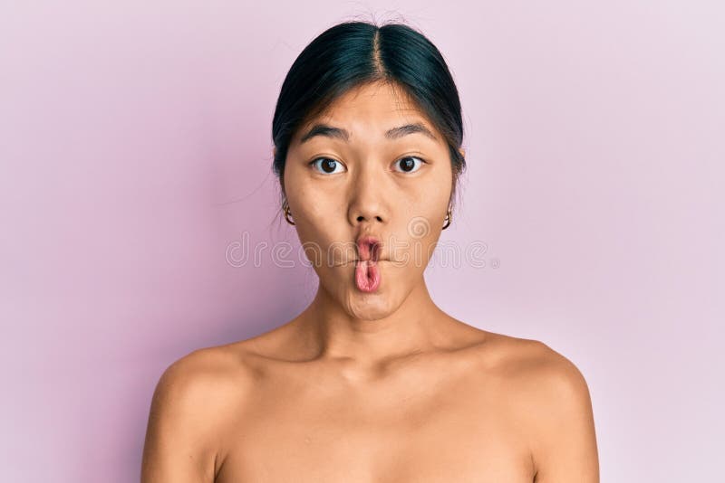 Young Chinese Woman Standing Topless Showing Skin Making Fish Face with Lips, Crazy and Comical Gesture Stock Image - Image of adult, confident: 218822037 Young Chinese Woman Standing Topless Showing Skin Making Fish Face with Lips, Crazy and Comical Gesture Stock Image - Image of adult, confident: 218822037