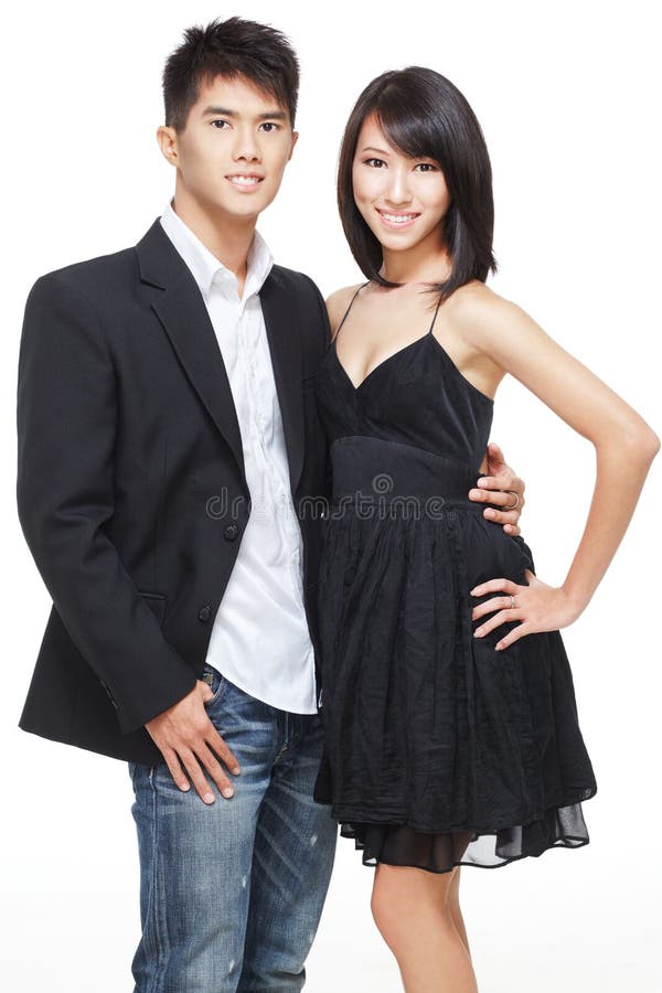 Young, Chinese working couple dressed for party