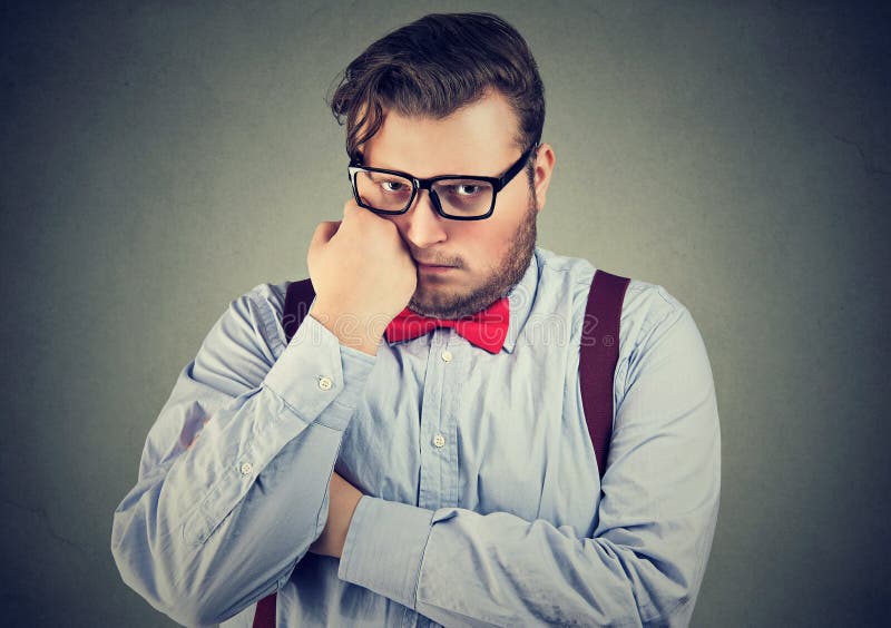 Unhappy young man with overweight royalty free stock photo Unhappy young man with overweight royalty free stock photo
