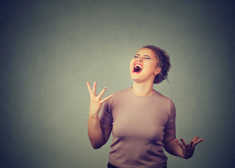 Screaming young woman in madness stock photos Screaming young woman in madness stock photos