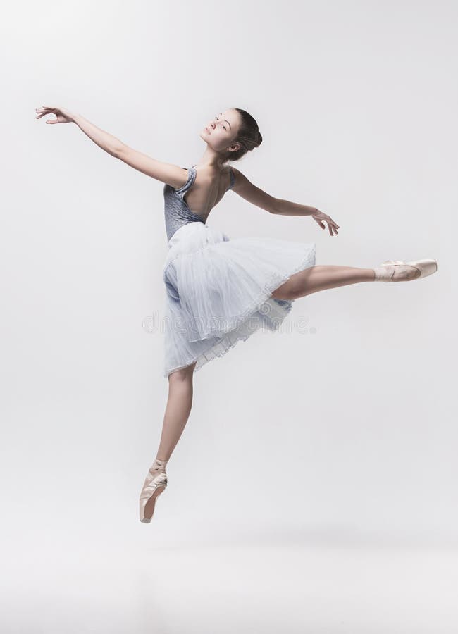 Young classical dancer isolated on white background.