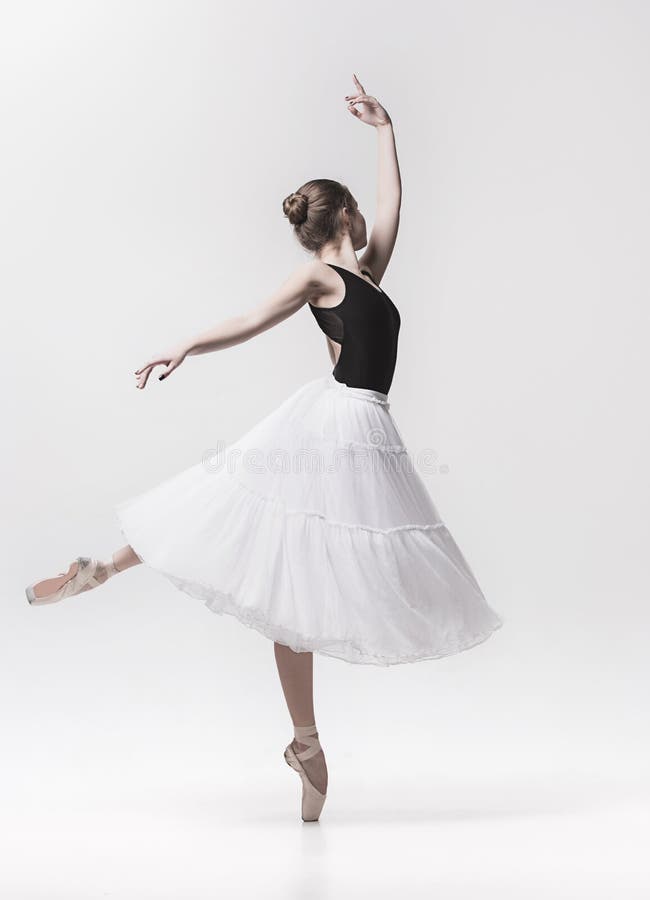 Young classical dancer isolated on white background. stock photography