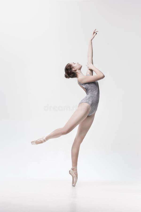 Young classical dancer isolated on white background. stock image