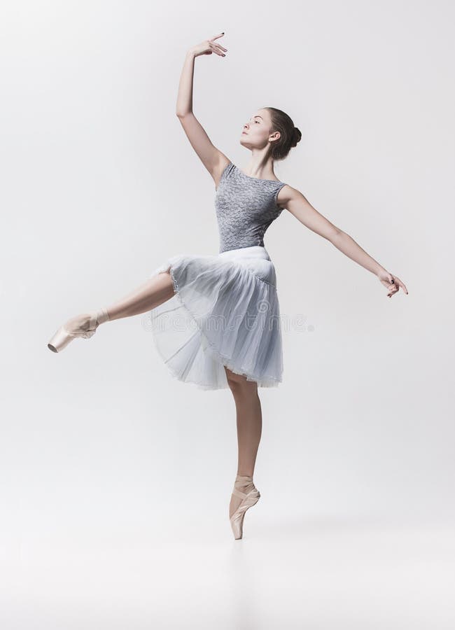 Young classical dancer isolated on white background.