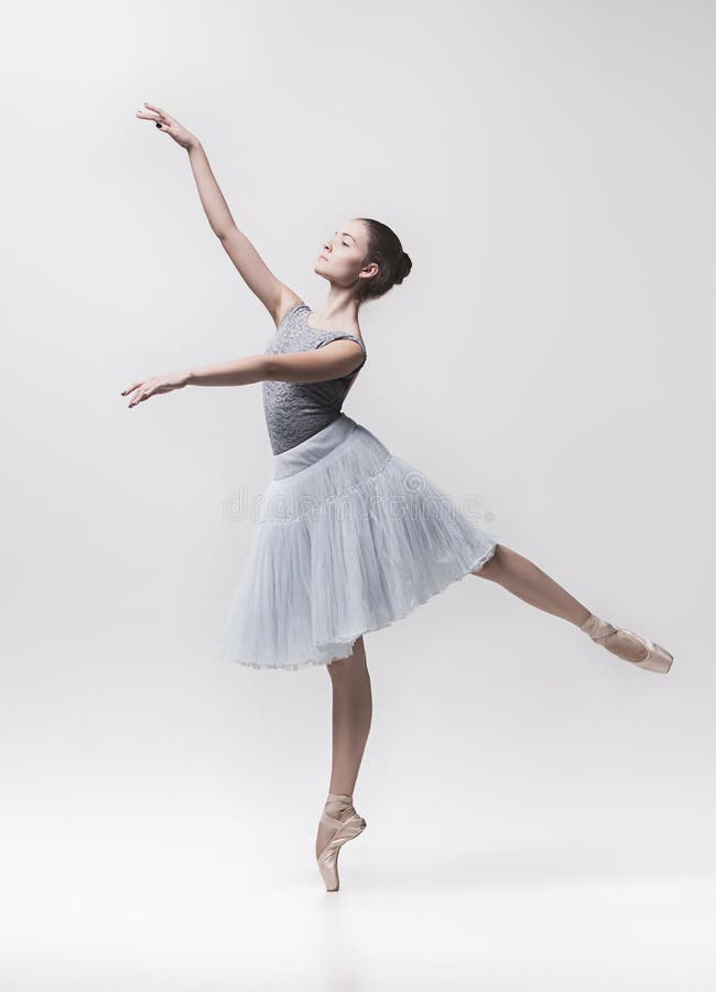 Young classical dancer isolated on white background.