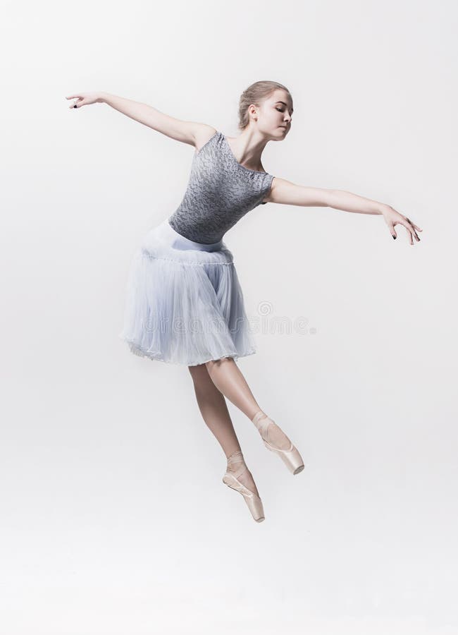 Young classical dancer isolated on white background. royalty free stock images