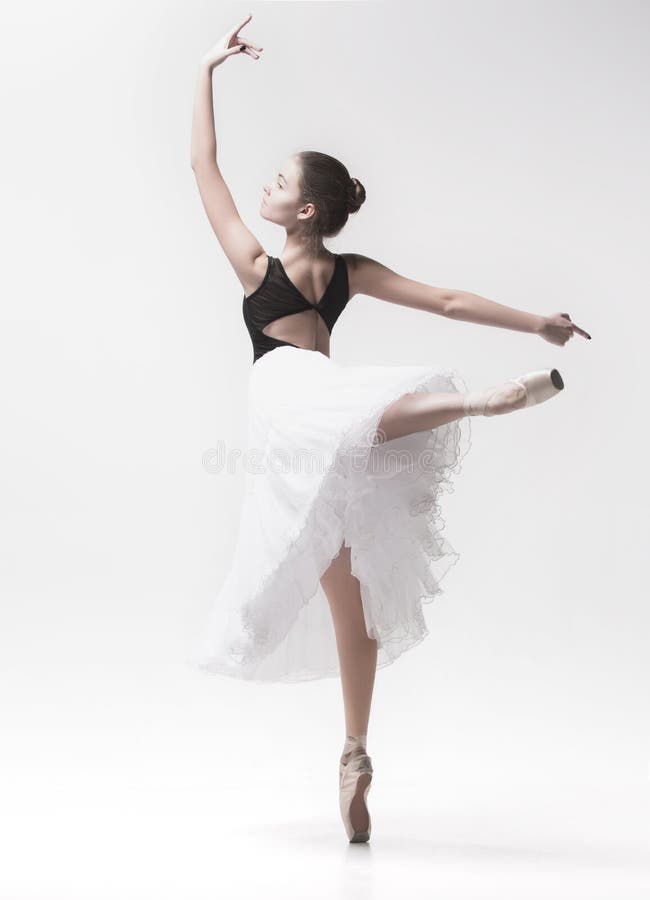 Young classical dancer isolated on white background. stock image