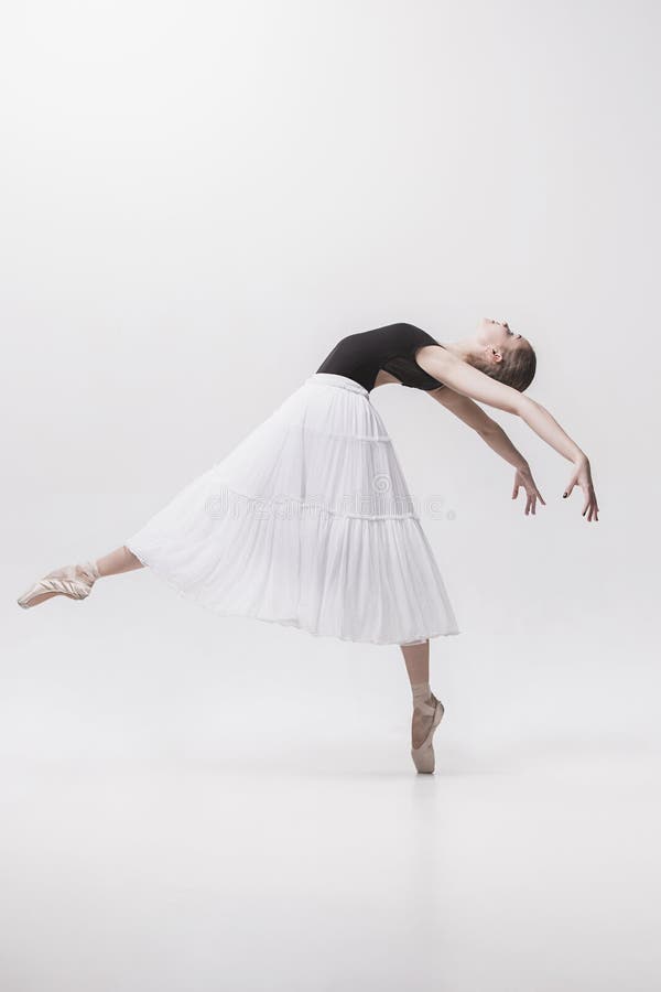 Young classical dancer on white background. royalty free stock photos