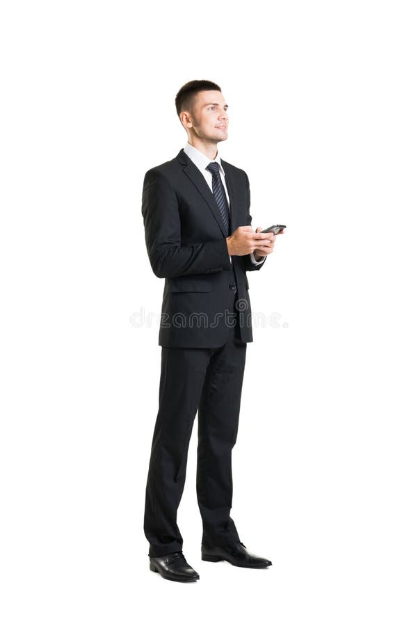 Young and confident business man with a telephone