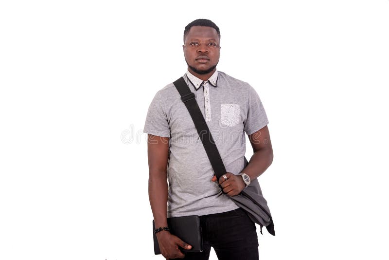 Young Confident Man Carrying Bag Over Shoulder and Holding Digital