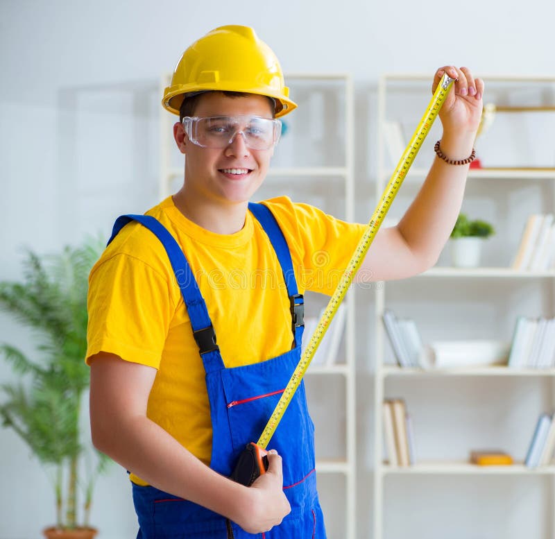 Young Contractor Doing Repair Works at Office Stock Image Image of