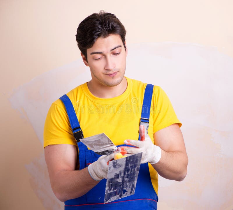 Young Contractor Employee Applying Plaster on Wall Stock Image Image of plasterer, improvement