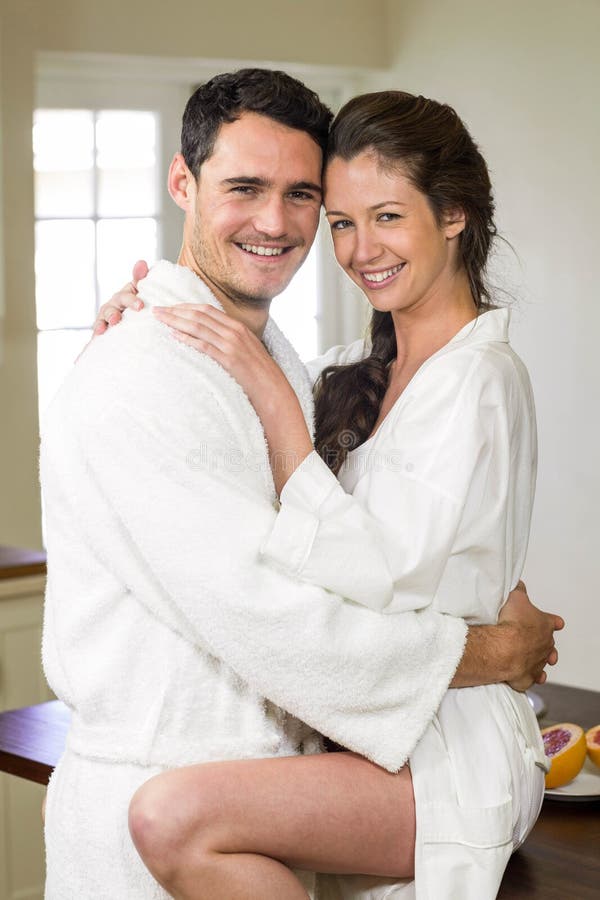 Young Couple in Bathrobe Cuddling Each Other Stock Image Image of