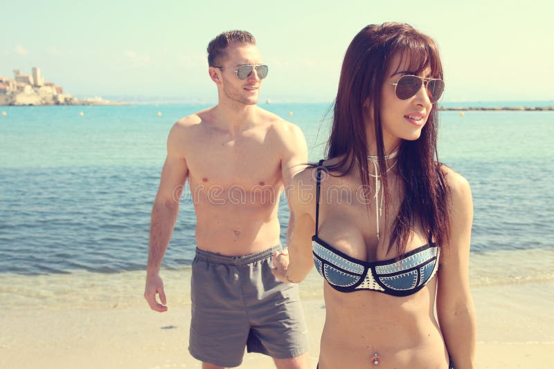 Young couple on the beach royalty free stock photo Young couple on the beach royalty free stock photo