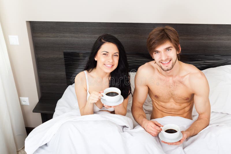 Young couple bed royalty free stock photos