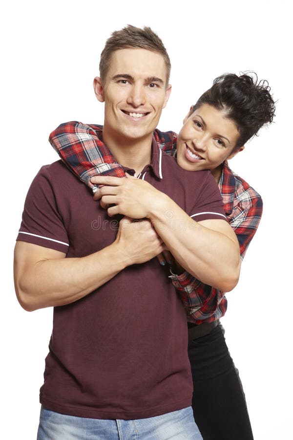 Young Couple Cuddling And Smiling Stock Photo Image of happiness