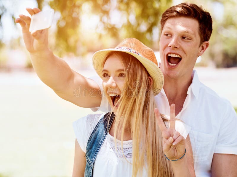 Young Couple Doing Selfie Outdoors Stock Image Image Of Mobile