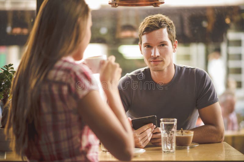 Young couple drinking coffee