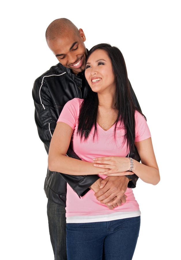 Young couple embracing and smiling stock photos Young couple embracing and smiling stock photos