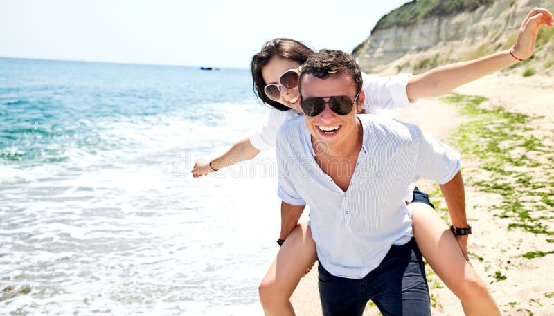 Young couple enjoing beach