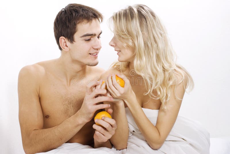 Young couple enjoying fruits