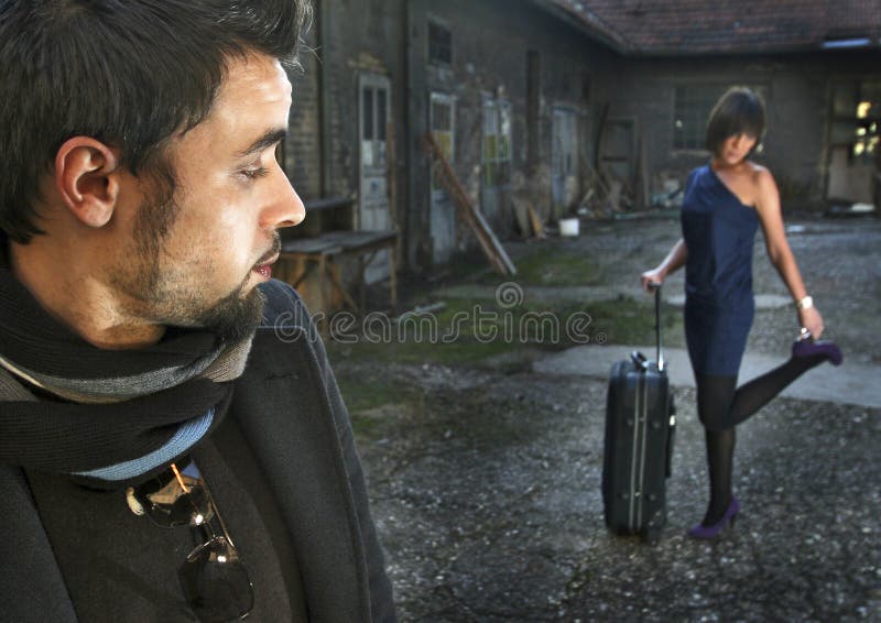 Young couple standing in back yard and flirting. Happy embracing couple stock images, royalty-free photos and pictures