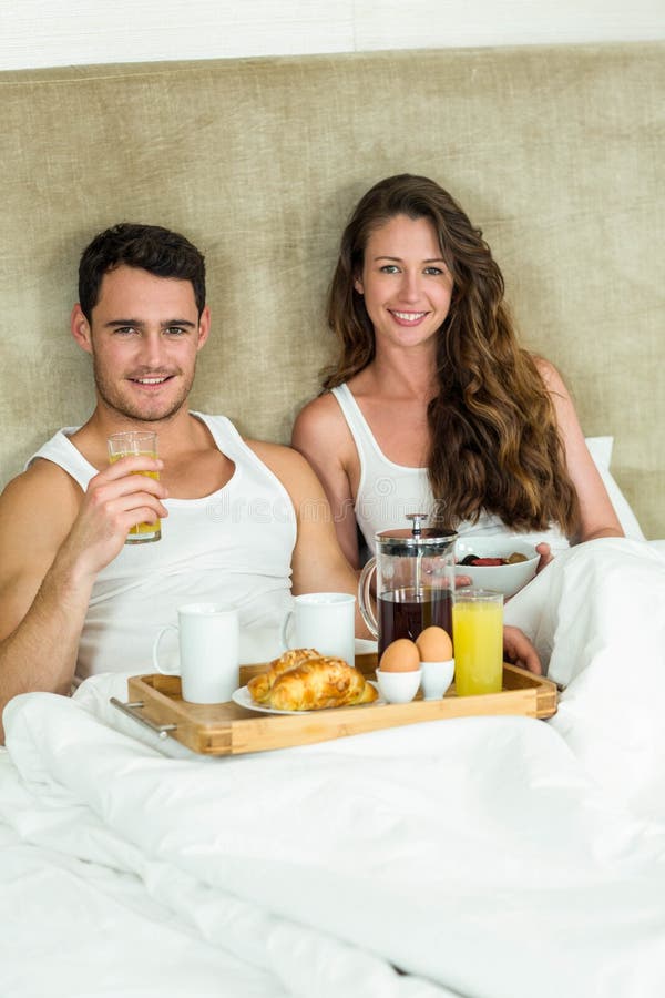 Young Couple Having Breakfast On Bed Stock Image Image Of Adorable 