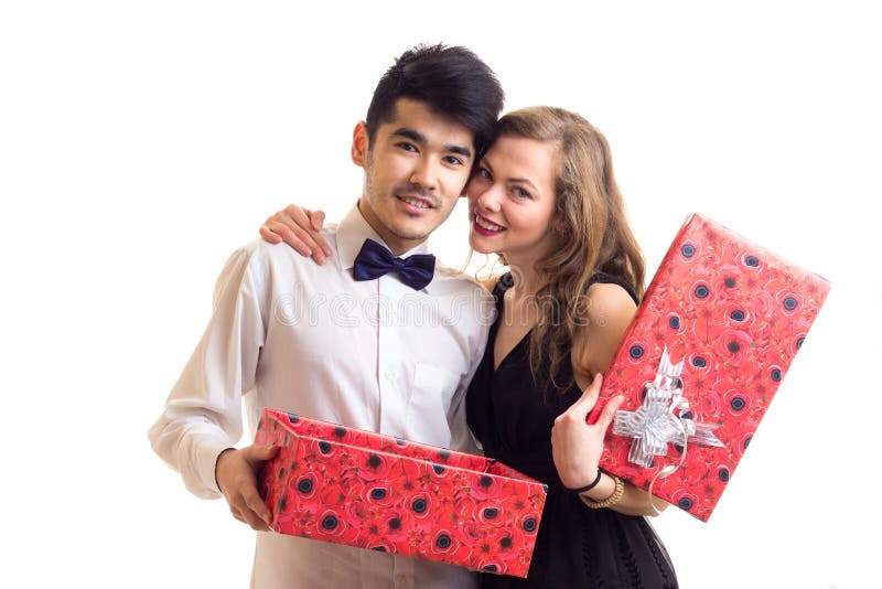 Young Couple Holding a Present Stoc