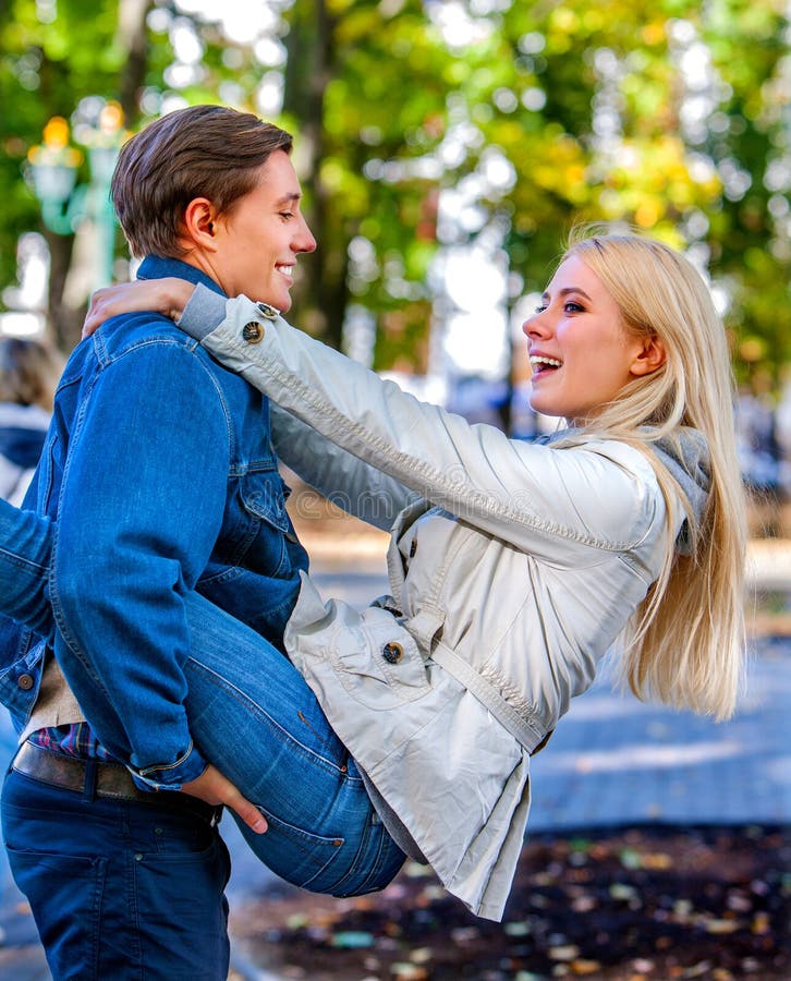 Young Couple Hugging and Flirting in Park Stock Photo Image of fall