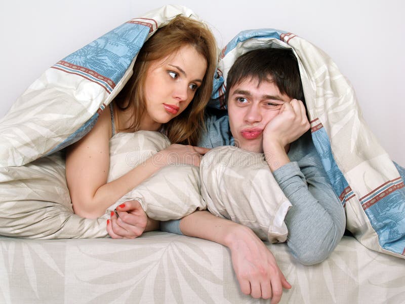 Young Couple Laying in Bed Together Stock Image - Image of beautiful ...