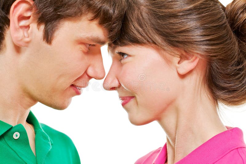 Premium Photo  Two young lovers. profiles of romantic couple looking at  each other